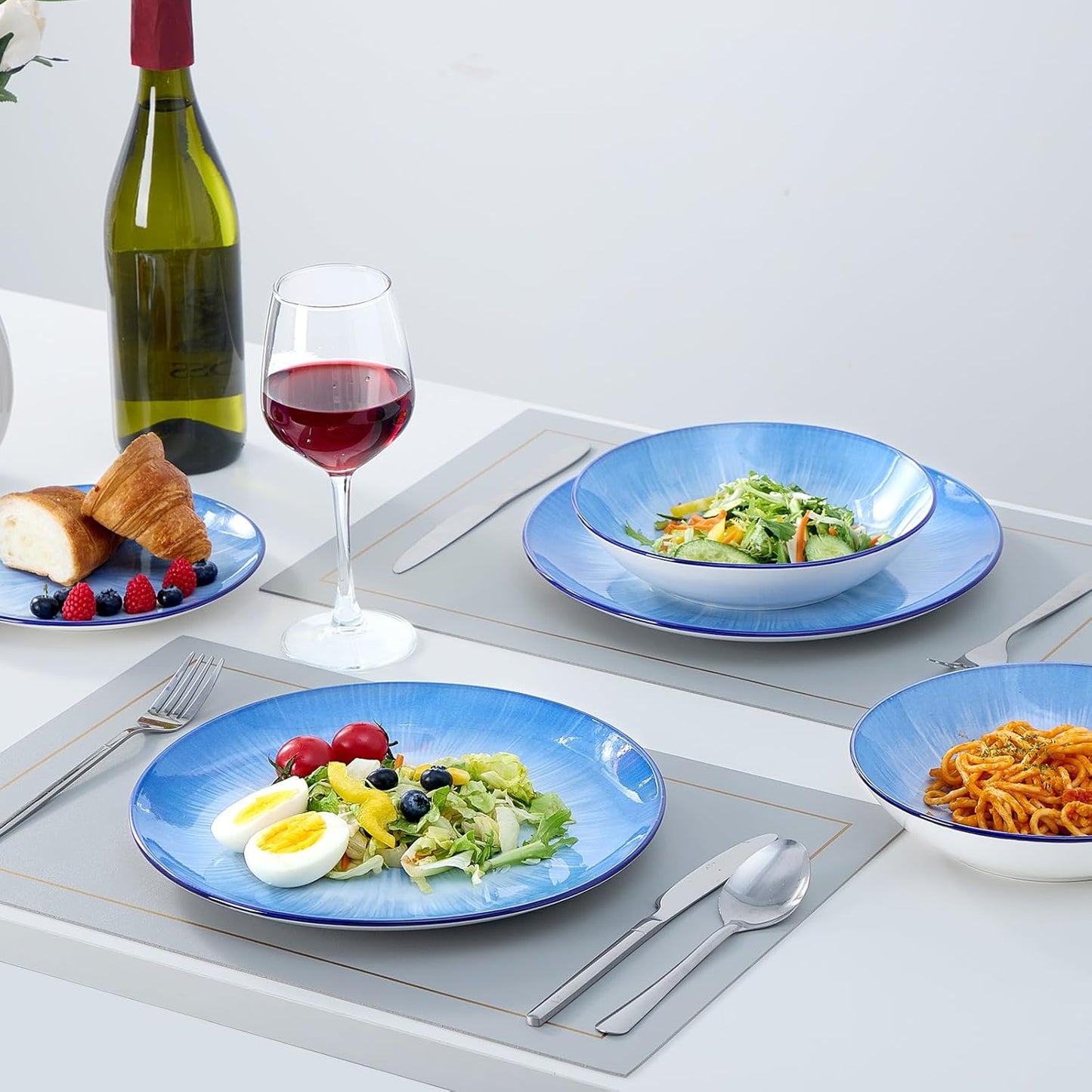 Bestone Porcelain Dinnerware Sets Service for 4, 12 pcs Hand drawn Plates and Bowls Sets, Handmade Ceramic Dish Set, Chip Resistant Modern Plate Set, Dishwasher/Microwave Safe,Starburst blue