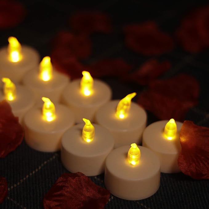 YIWER Battery Tea Lights Candles Set of 24: Flickering flameless Realistic Tealights with Warm Yellow Light Candle Light for Festivals Parties Halloween Warm Atmosphere