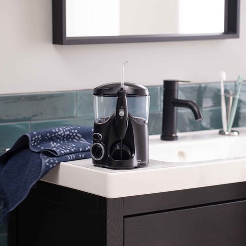 Waterpik Ultra Water Flosser, Black - 90+ Seconds of Flossing Time - 10 Pressure Settings, 360-Degree Tip Rotation - Includes Six Tips & Built-in Tip Storage