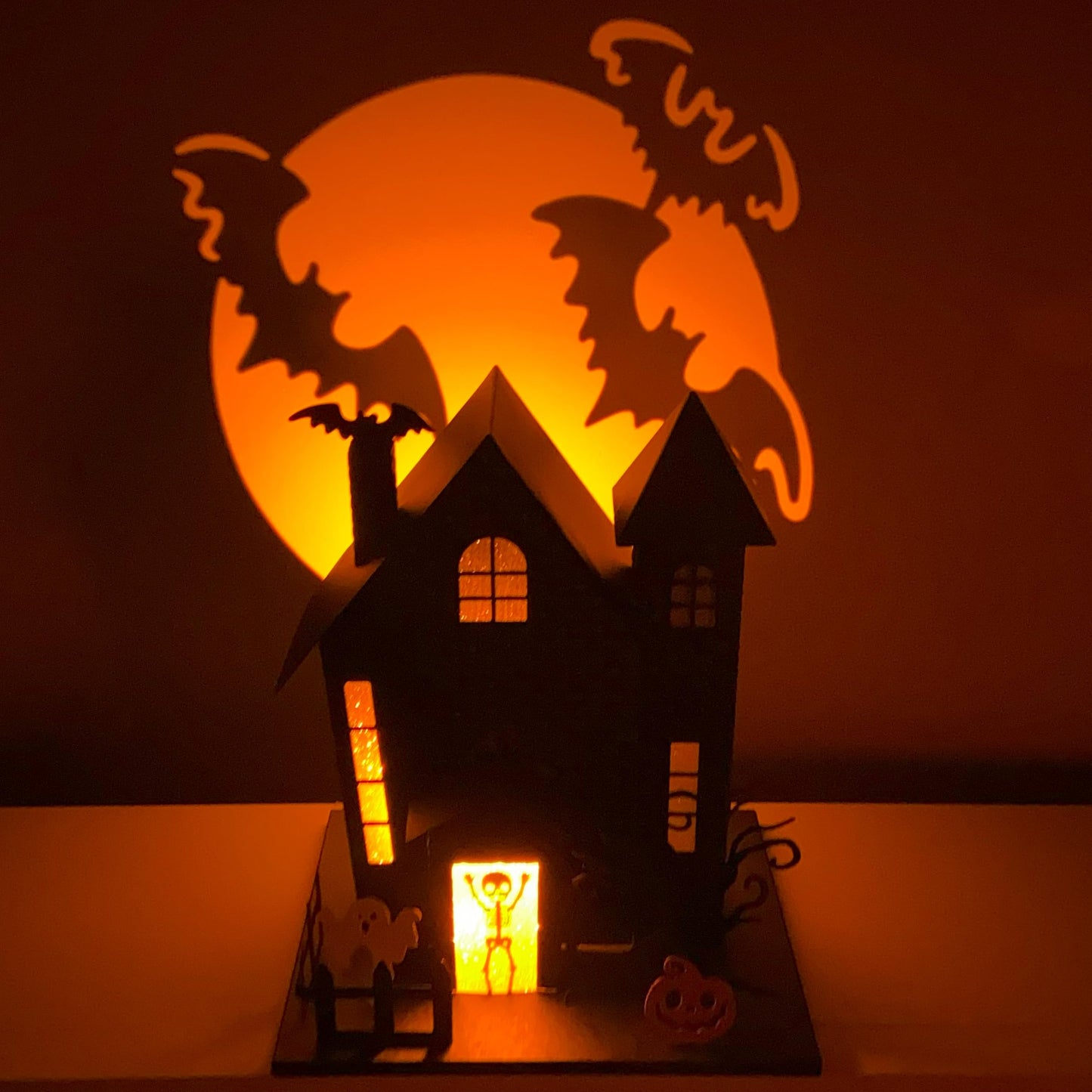 Haute Decor Halloween Haunted House with Bat Projection - Unique Lighted Black Metal Haunted House for Tabletop Halloween Decoration