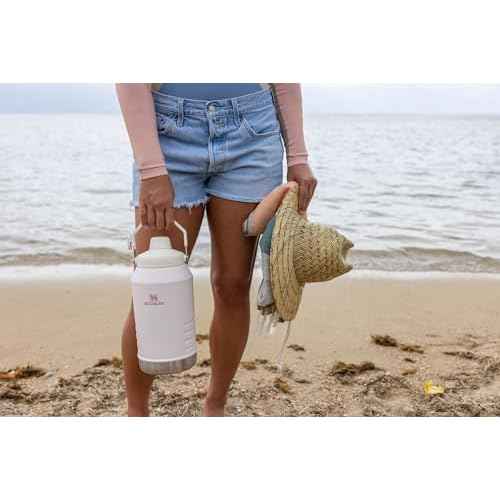 Stanley IceFlow Fast Flow Jug with Handle 96 oz | Twist On Angled Spout Lid | Leakproof for Travel and Sports | Insulated Stainless Steel | BPA-Free | Rose Quartz