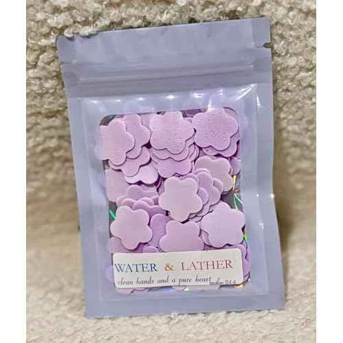 Soap confetti! party favors! spa day! Lavander soap flakes. Perfect for bathrooms, party favors, luxurious baths, and travel, these soap petals are great for washing hands or soaking in the tub.