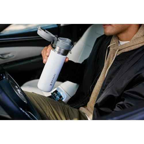 Stanley Quick Flip GO Water Bottle 36 oz | Push Button Lid | Leakproof and Packable for Travel and Sports | Insulated Stainless Steel | BPA-Free | Black