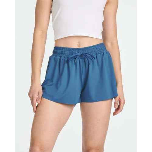 Real Essentials 4 Pack:Womens Flowy Dry Fit Running Short - Spandex Underneath Workout Summer Shorts (Available in Plus Size)