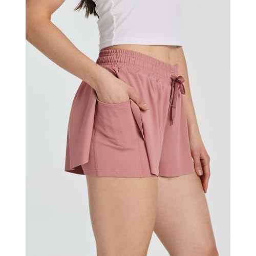 Real Essentials 4 Pack:Womens Flowy Dry Fit Running Short - Spandex Underneath Workout Summer Shorts (Available in Plus Size)