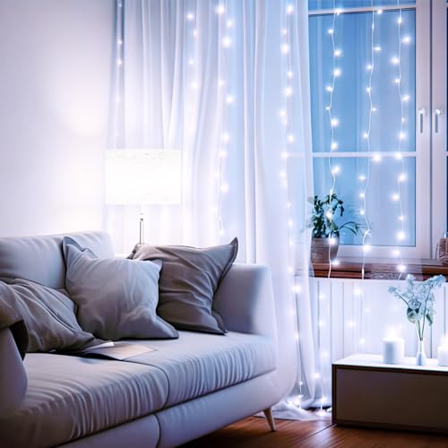 Aurelema 600 LED 20 x 9.8 Ft Christmas Curtain Lights 8 Modes Outdoor Fairy Lights with Remote Plug in Hanging String Fair...