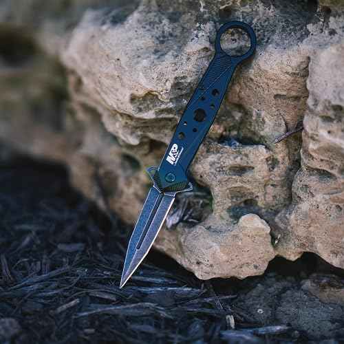Smith & Wesson Accessories The Smith & Wesson M&P Folding Spear Point Featuring 8Cr13MoV Stainless Steel And Ergonomic Finger Loop Designed For EDC And Quick Deployment