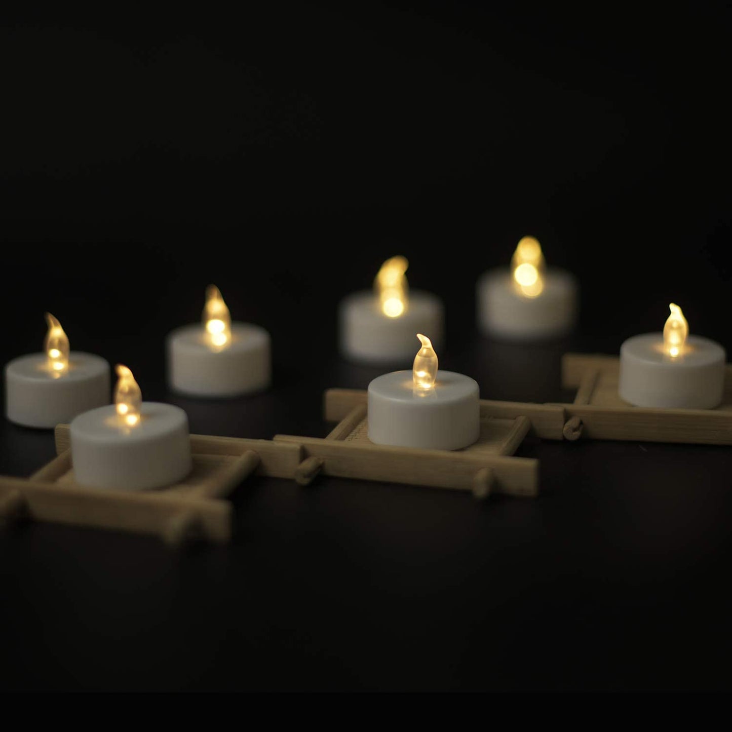 YIWER Flameless Tea Lights Candles - Realistic LED Flickering Operated Tea Lights Battery Tealights Long Lasting Electric Fake Candles in Warm White 200pcs Decoration for Party and Gifts Ideas