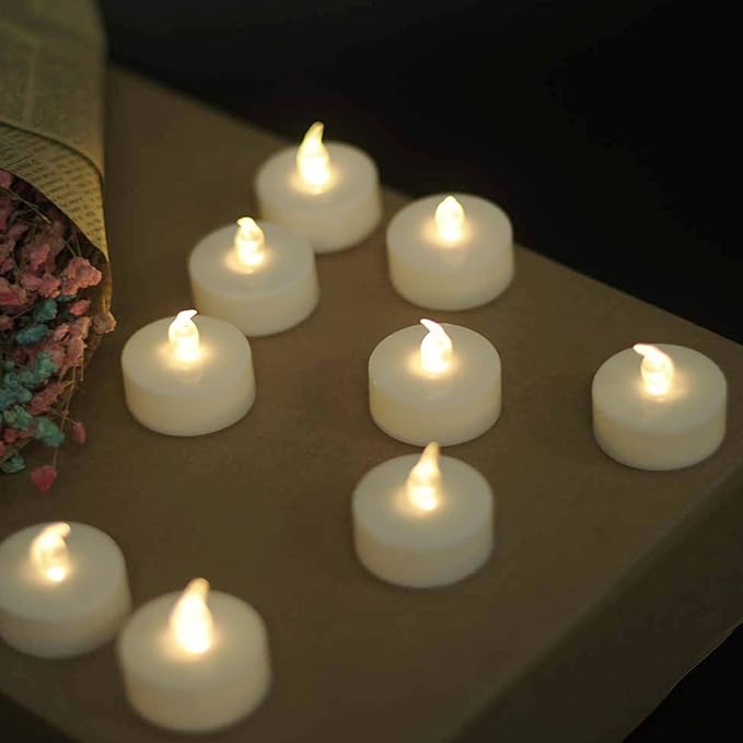 YIWER Battery Tea Lights Candles Set of 24: Flickering flameless Realistic Tealights with Warm White Light Candle Light for Festivals Parties Halloween Warm Atmosphere