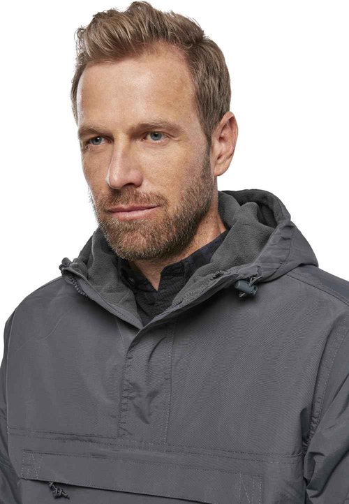Brandit Individual Wear Men's Windbreaker Fall Jacket, with 100% Polyester, Water & Wind Resistant, and Zip Pockets, Anthracite - XX-Large