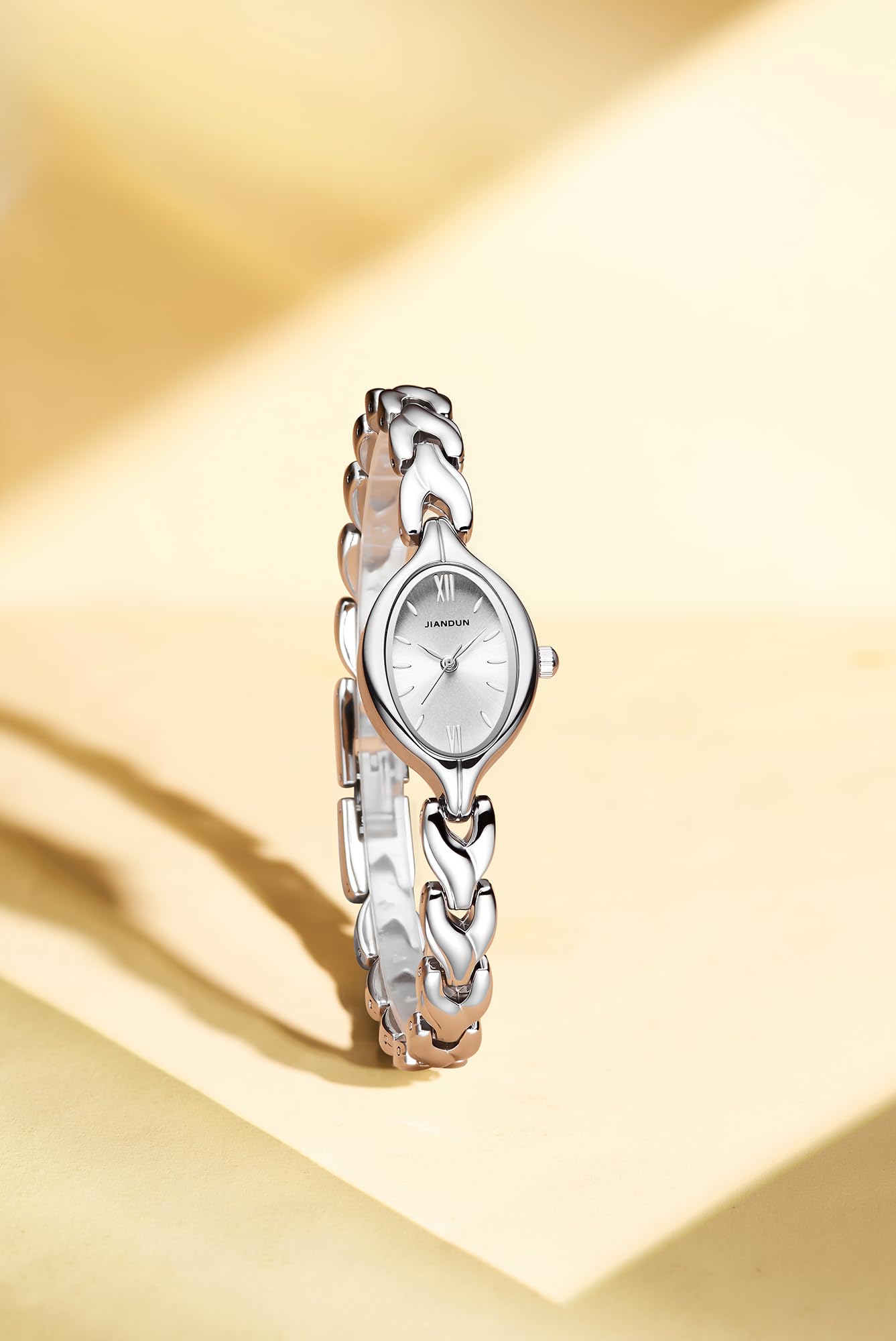 JIANDUN Vintage Women's Oval Bracelet Watch, Waterproof Stainless Steel Band with Adjustment Tool, Retro Ladies Quartz Wristwatch, Perfect for Daily Wear and Special Occasions (All Silver)