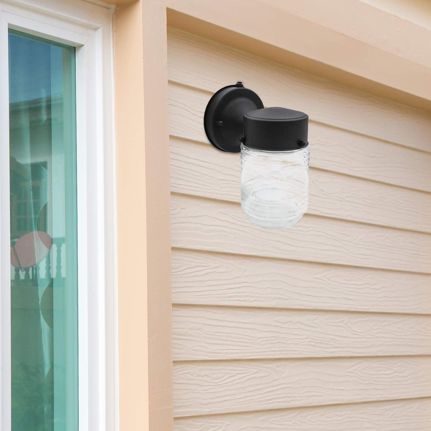 Maxxima Outdoor Wall Lantern Light Fixture, Enclosed Clear Ribbed Glass Jelly Jar Exterior Light, Black Finish, Dusk to Dawn Sensor, 800 Lumens, Photocell Sensor, 3000K Warm White