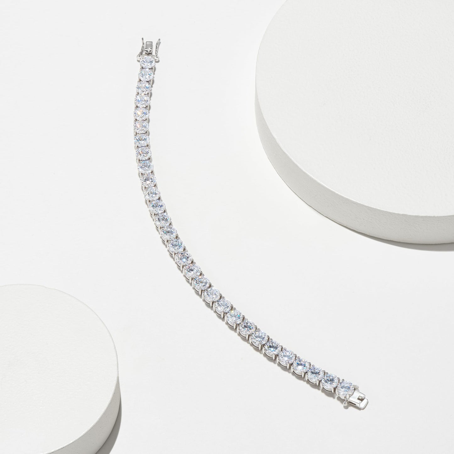 Amazon Essentials Platinum Plated Sterling Silver Round Cut Cubic Zirconia Tennis Bracelet (4mm), 7.75 (previously Amazon Collec