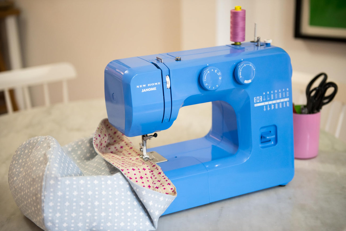 Janome Blue Couture Easy-to-Use Sewing Machine with Interior Metal Frame, Bobbin Diagram, Tutorial Videos, Made with Beginners in Mind!