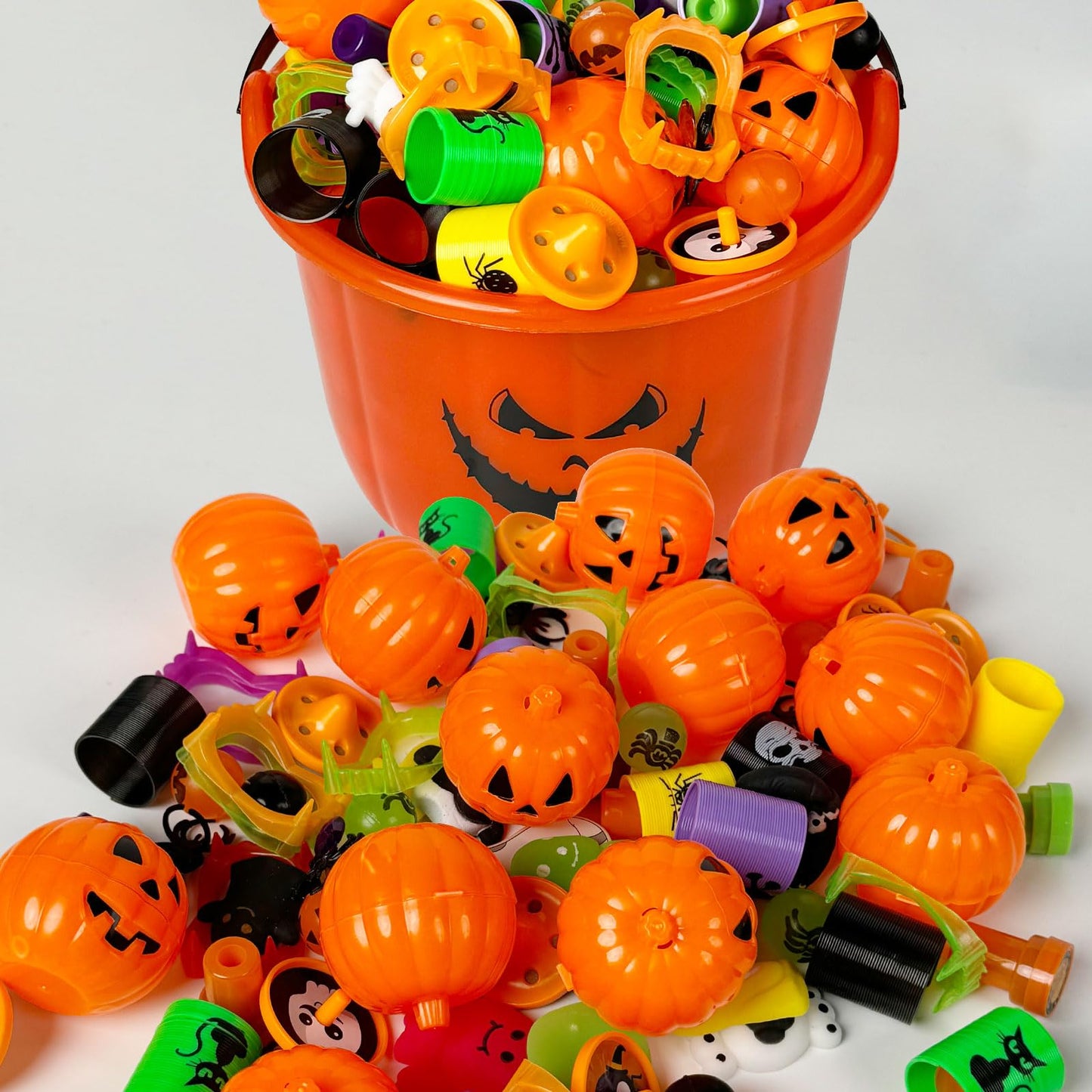 novelinks Halloween Party Favors for Kids 96PCS Halloween Toys in Bulk Halloween Prefilled Plastic Pumpkins Buckets Halloween Goodie Bag Fillers Treats Prizes Halloween Toys Gifts for Boy Girl Random
