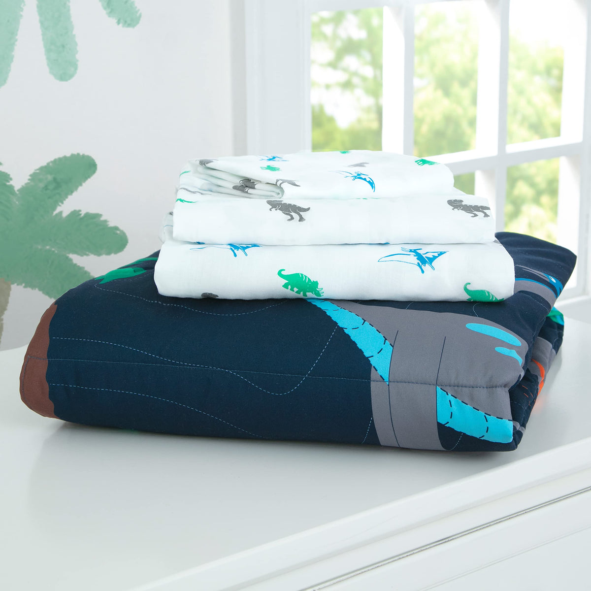 Delta Children 4 Piece Toddler Bedding Set for Boys - Reversible 2-in-1 Comforter - Includes Fitted Comforter to Keep Little Ones Snug, Bottom Sheet, Top Sheet, Pillow Case - Jurassic Dinosaur