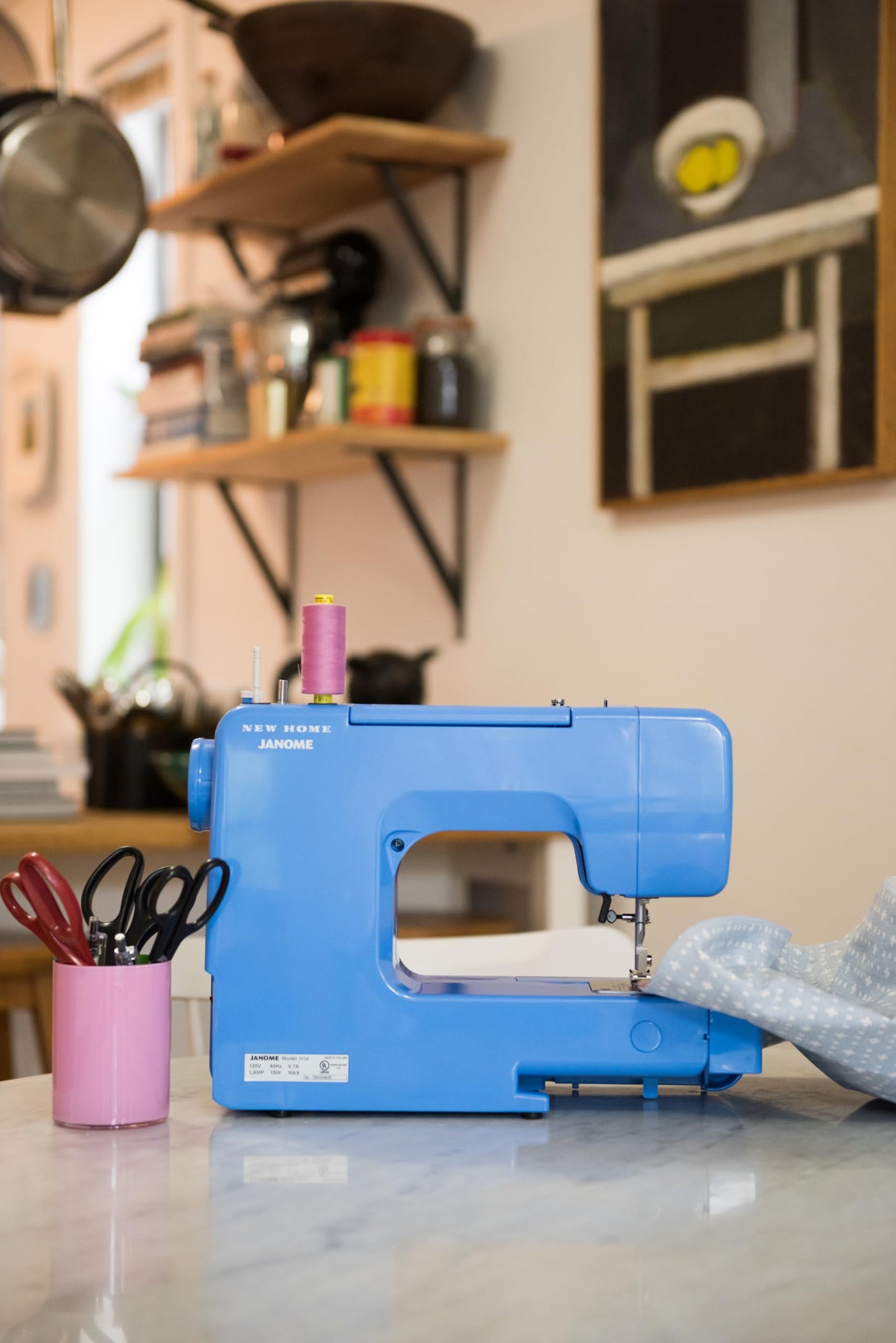 Janome Blue Couture Easy-to-Use Sewing Machine with Interior Metal Frame, Bobbin Diagram, Tutorial Videos, Made with Beginners in Mind!