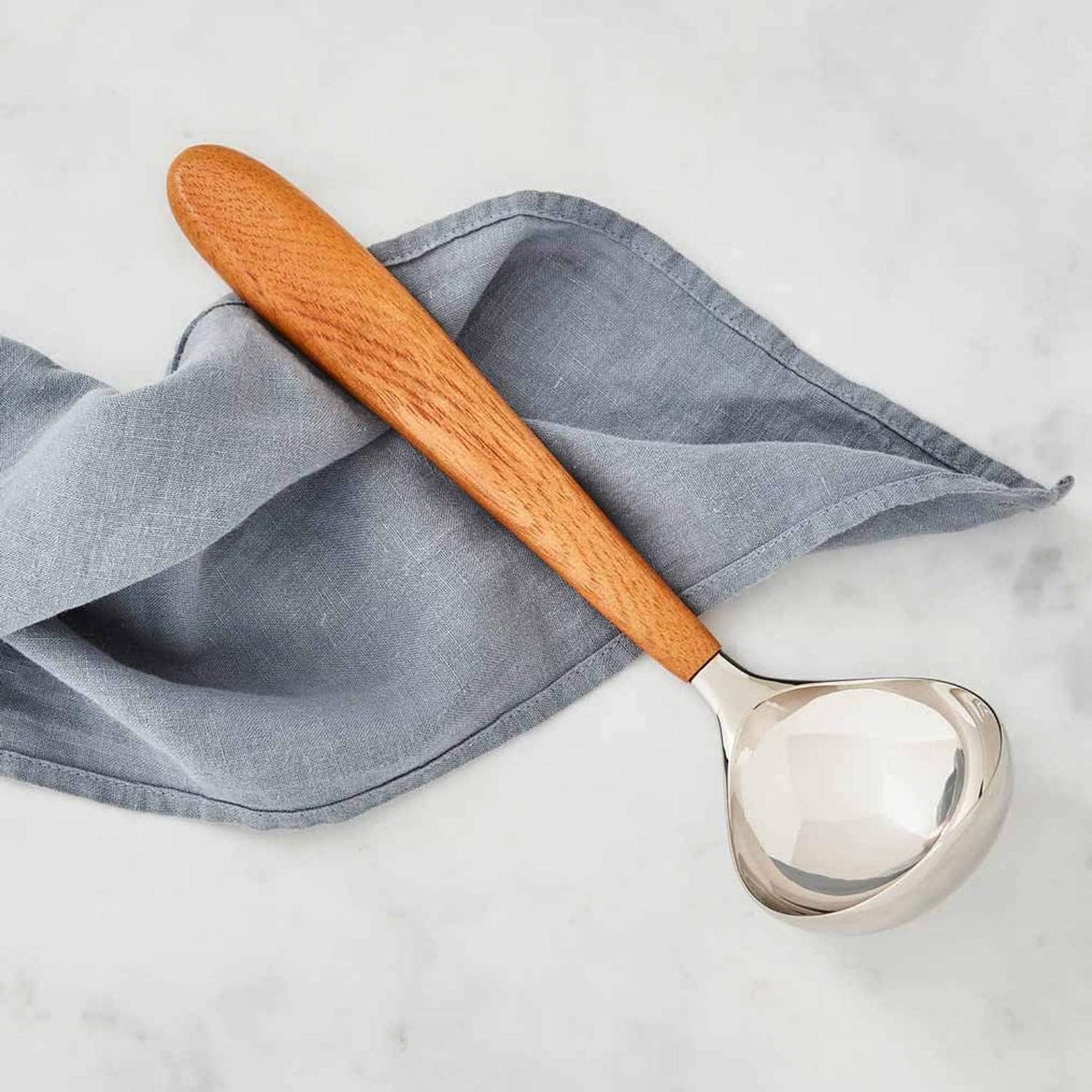 nambe Curvo Kitchen Ladle | 12.5 Inch Ladle for Serving Soups, Stews, and Sauces | Made of Stainless Steel and Acacia Wood | Designed by Steve Cozzolino