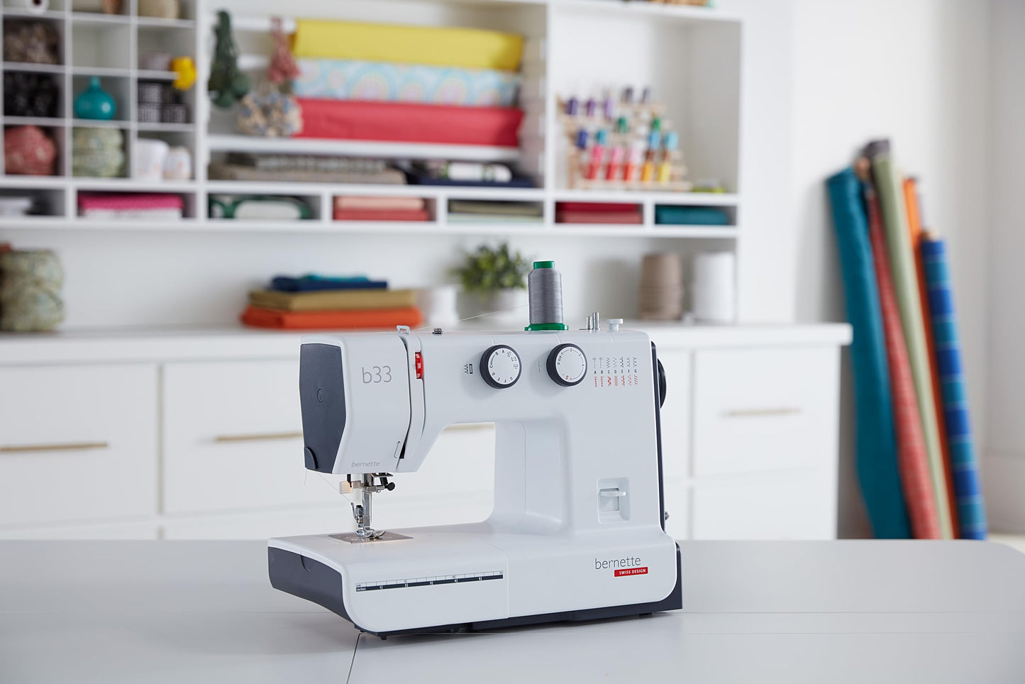Bernette B33 Swiss Design Sewing Machine | Mechanical, Heavy-Duty, Portable, 15 Built-In Stitches, 5mm Stitch Width, Front-Loading Bobbin, Semi-Automatic Threader, Cutter,10 Bobbins