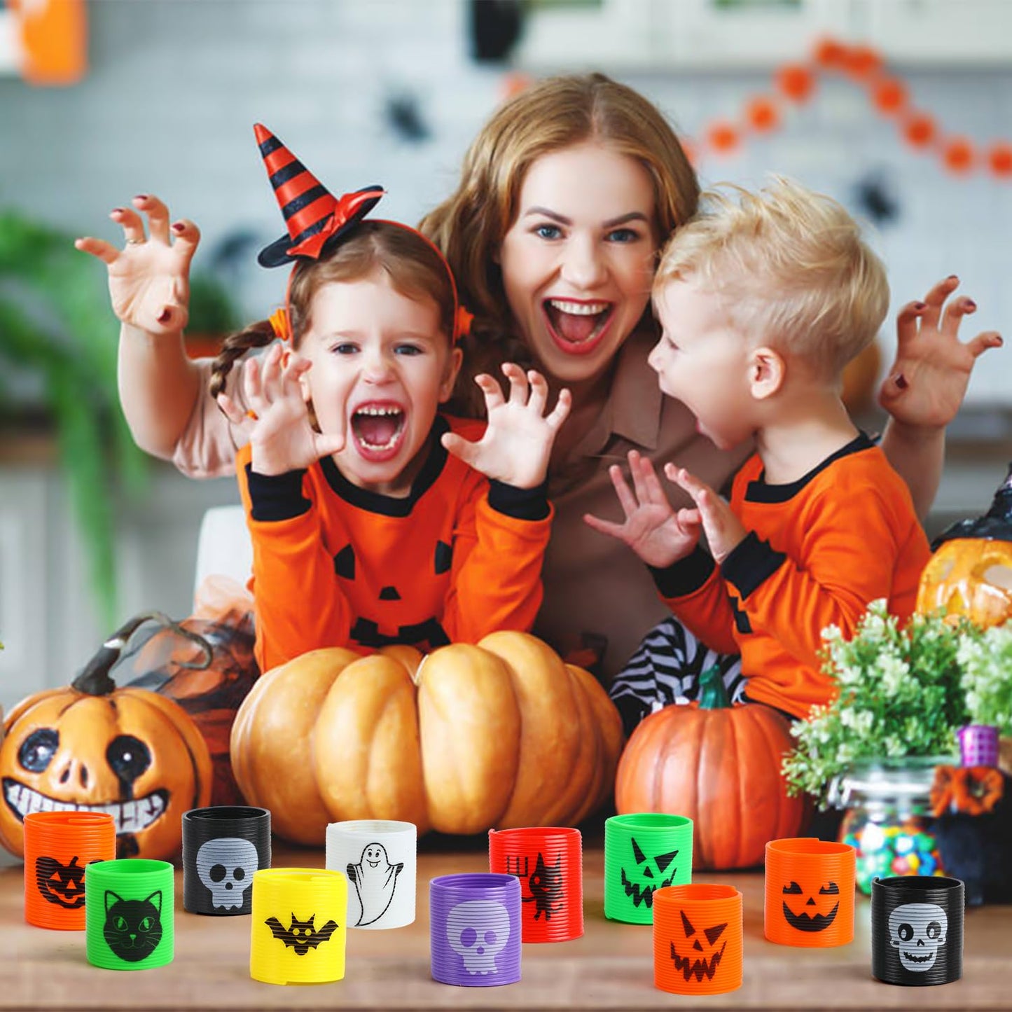 SULOLI Halloween Coil Springs for Kids, 36pcs Assorted Halloween Theme Pattern Spring Toys Party Favors Halloween Treat Bags Gifts