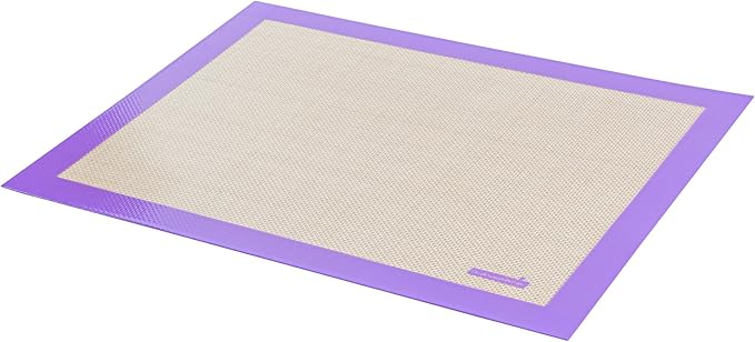 Restaurantware Half Size Baking Mat 1 Heat-Resistant Cooking Mat - Allergen-Safe Reusable And Ultra-Durable Tan And Purple Silicone Nonstick Mat For Pans And Rolling 11.8 x 15.75 Inch