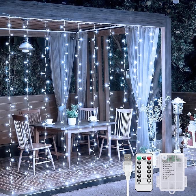 JMEXSUSS 200 LED Fairy Curtain Lights Battery Operated & USB Plug in - Remote Curtain String Lights for Bedroom with 8 Mod...