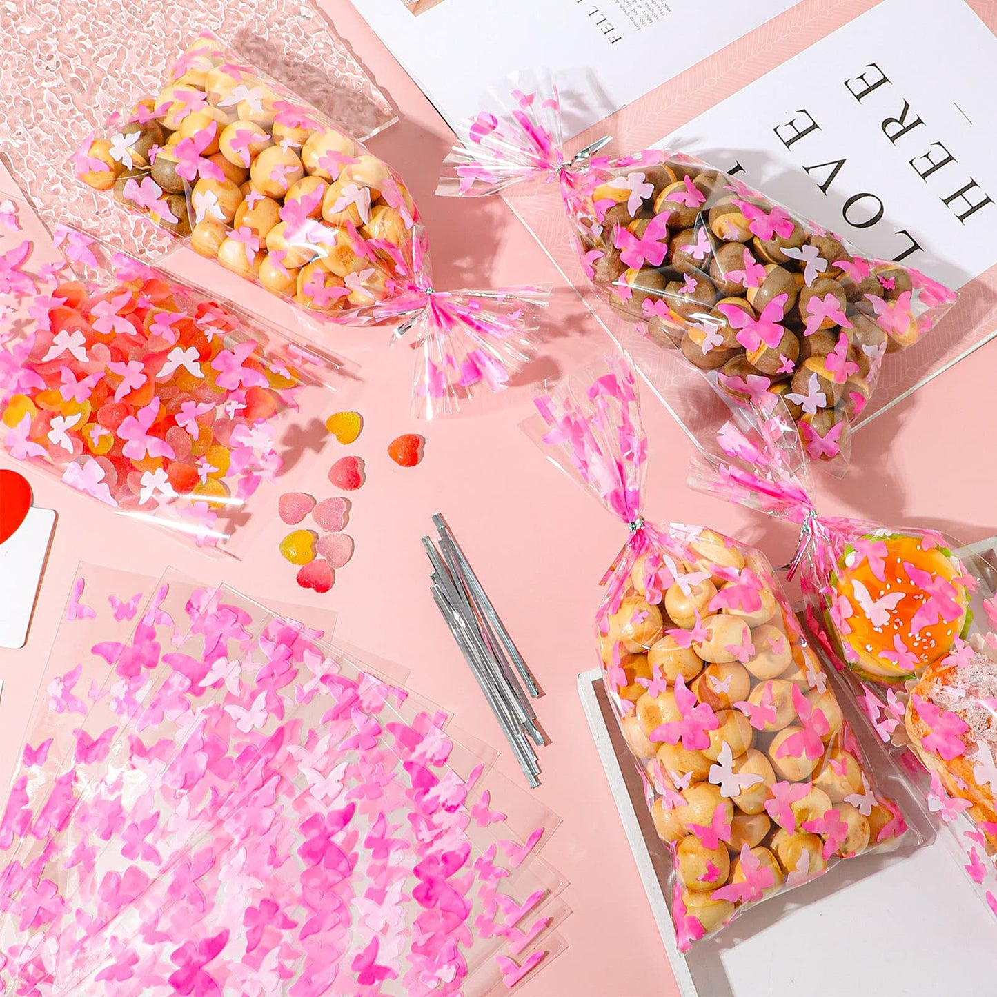 Zonon 100 Pieces Butterflies Cellophane Goody Bags Plastic Candy Treat Bags with 100 Pieces Silver Twist Ties for Butterfly Theme Baby Shower Birthday Party Dessert Decors(Pink)