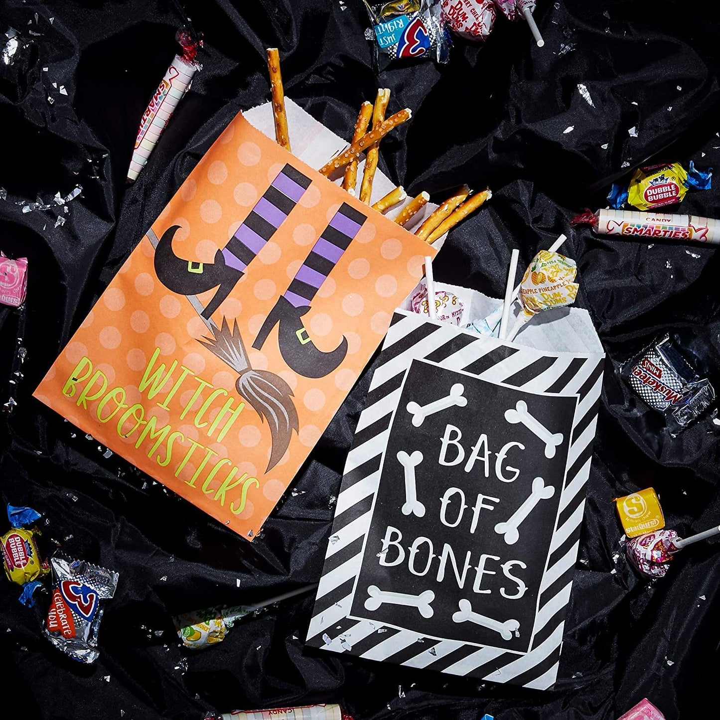 BLUE PANDA 100-Pack Halloween Paper Treat Bags - Small Candy and Favor Containers - 4 Spooky Designs: Vampire Teeth, Witch Broomsticks, Bag of Bones & Spider Eggs (7.5"x5.2")