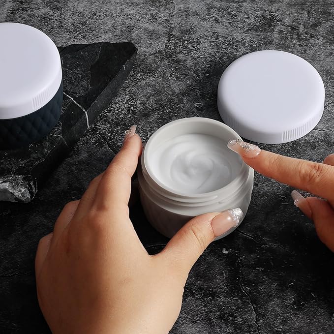 Travel Containers for Toiletries, Silicone Cream Jars BPA-Free, TSA Approved 2oz Travel Size Containers, Leak-proof Silicone Jars with Lid for Cosmetic Face Hand Body Cream (4 Pack)