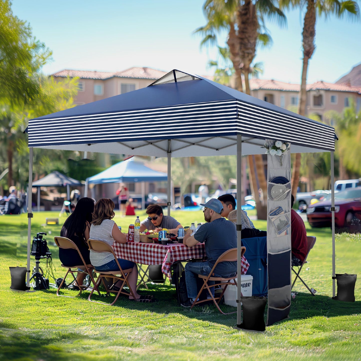 PHI VILLA 10’x10’ Pop Up Canopy Tent - One Push Setup, Instant Shade Tent with Vented Roof for Beach & Events - Includes Storage Bag, Sandbags, Stakes & Ropes (Navy Stripe)