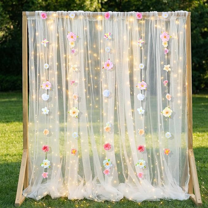 Gilprop 2 Panels White Tulle Backdrop Curtain with Lights String & 5 Pcs Artificial Hanging Flowers Garland 10×8ft Sheer B...