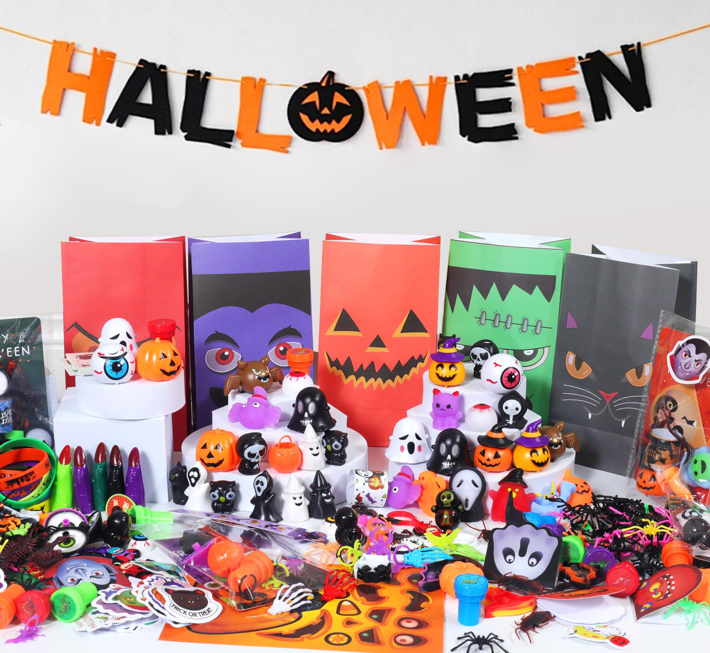 PLOUGVI 702PCS Halloween Party Favors Supplies Decorations - Trick or Treat Goodies Bag Fillers Stuffers - Halloween Toys for Classroom Prizes Gifts