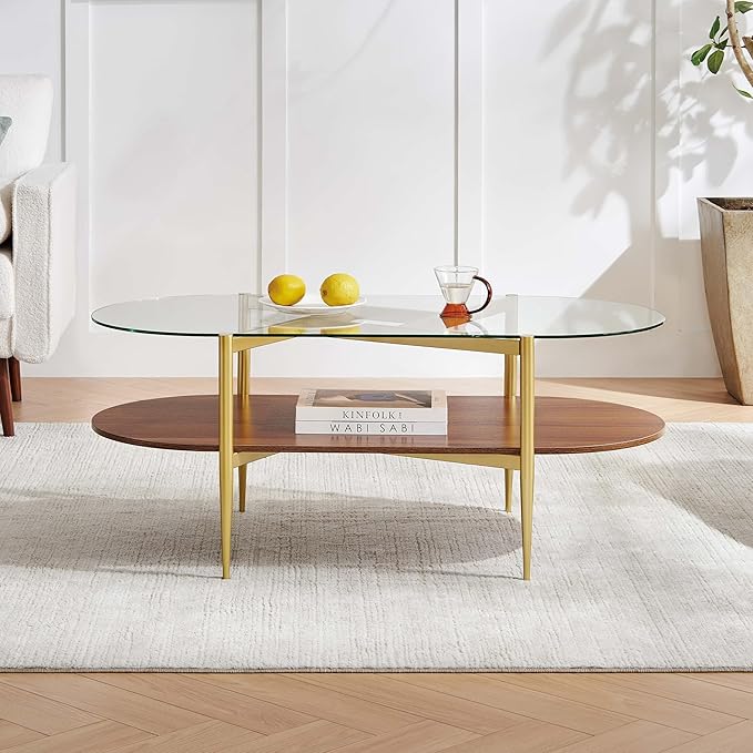 Pine Flicker Oval Glass Coffee Table, Mid-Century Modern Design, L42*W22*H17 inch, for Living Room, Clear Glass Top and Walnut Finish Wood Shelf, Conical Metal Legs with Gold Finish