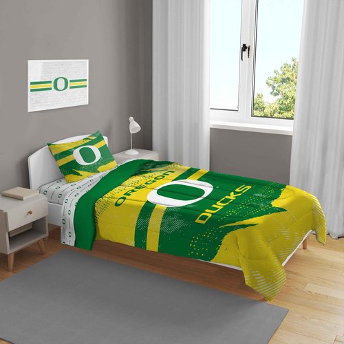 Pegasus Sports NCAA Oregon Ducks Slanted Stripe 4 PC Twin Bed in a Bag