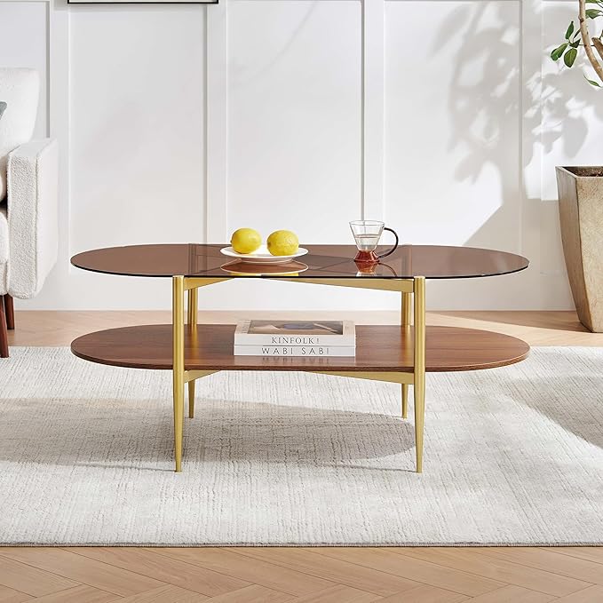 Pine Flicker Oval Glass Coffee Table, Mid-Century Modern Design, L42*W22*H17 inch, for Living Room, Amber Glass Top and Walnut Finish Wood Shelf, Conical Metal Legs with Gold Finish
