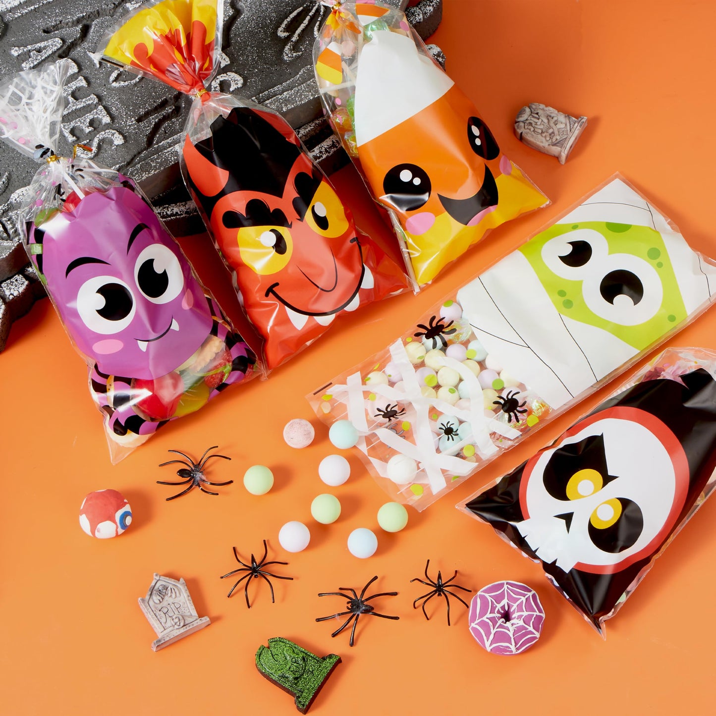 JOYIN 108 Pcs Halloween Cellophane Bags for Sweet Candy Treat, Goodie Gift Bags Bulk with Twist Tie for Kids Trick or Treating, Halloween Day Table Decor and Party Favor Supplies in 12 Designs