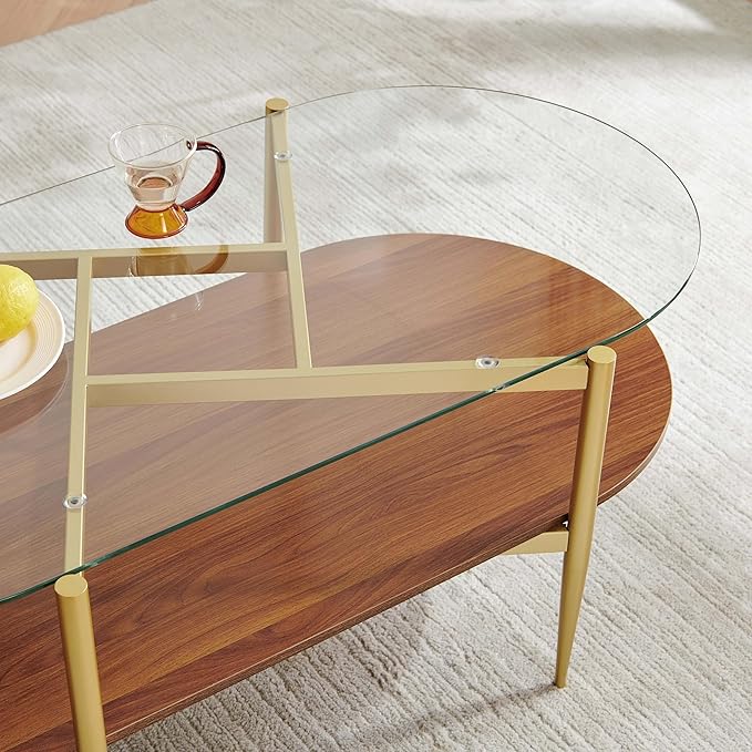 Pine Flicker Oval Glass Coffee Table, Mid-Century Modern Design, L42*W22*H17 inch, for Living Room, Clear Glass Top and Walnut Finish Wood Shelf, Conical Metal Legs with Gold Finish