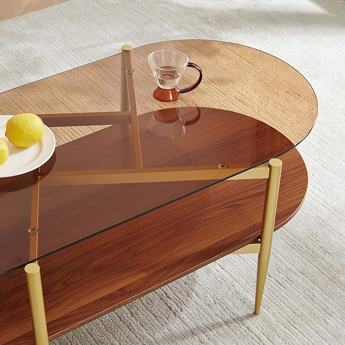 Pine Flicker Oval Glass Coffee Table, Mid-Century Modern Design, L42*W22*H17 inch, for Living Room, Amber Glass Top and Walnut Finish Wood Shelf, Conical Metal Legs with Gold Finish