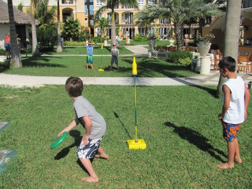 Bottle Bash Outdoor Flying Disc Game Set + Poleish Sports Bottle Bash Multi Surface Bases